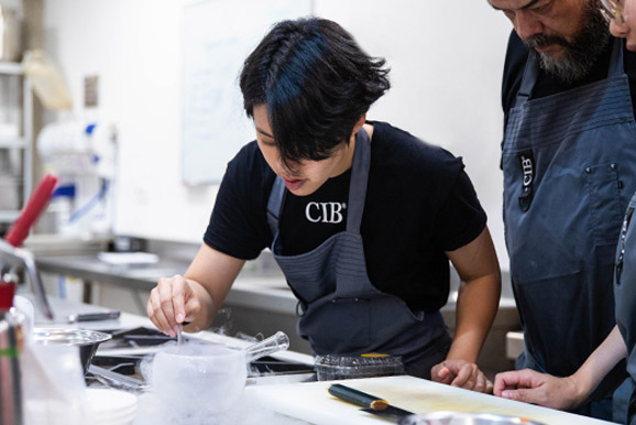 Combined program Student plating in the CIB professional healthy cooking course.